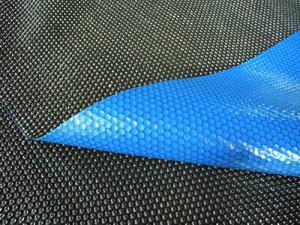 Blue/Black Solar Pool Cover, All Rights Reserved.