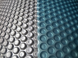 Blue/silver Solar Pool Cover, All Rights Reserved.